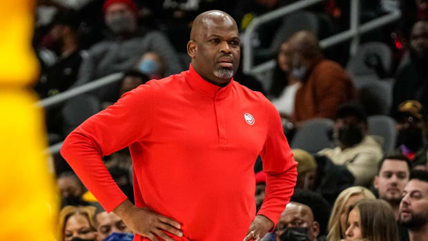 Jan 30, 2022; Atlanta, Georgia, USA; Atlanta Hawks head coach Nate McMillan follows the action against the Los Angeles Lakers during the first half at State Farm Arena.